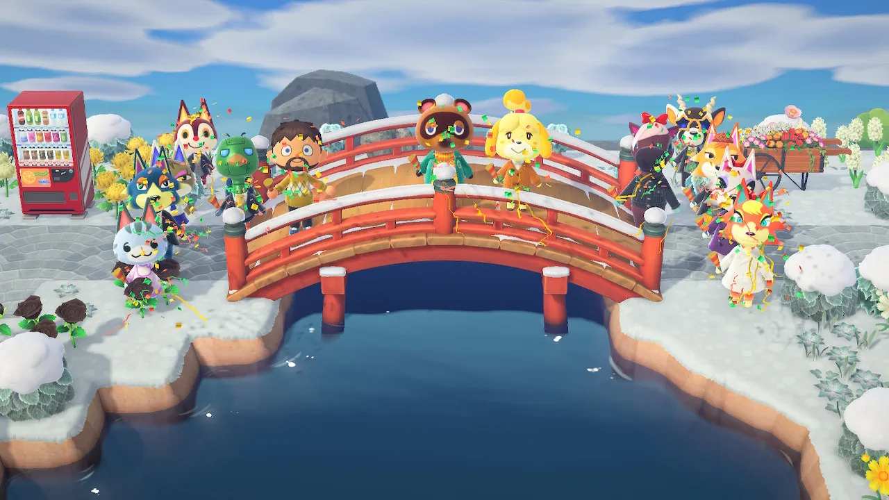 The whole village gathered for a dedication at the red Japanese arched bridge.
