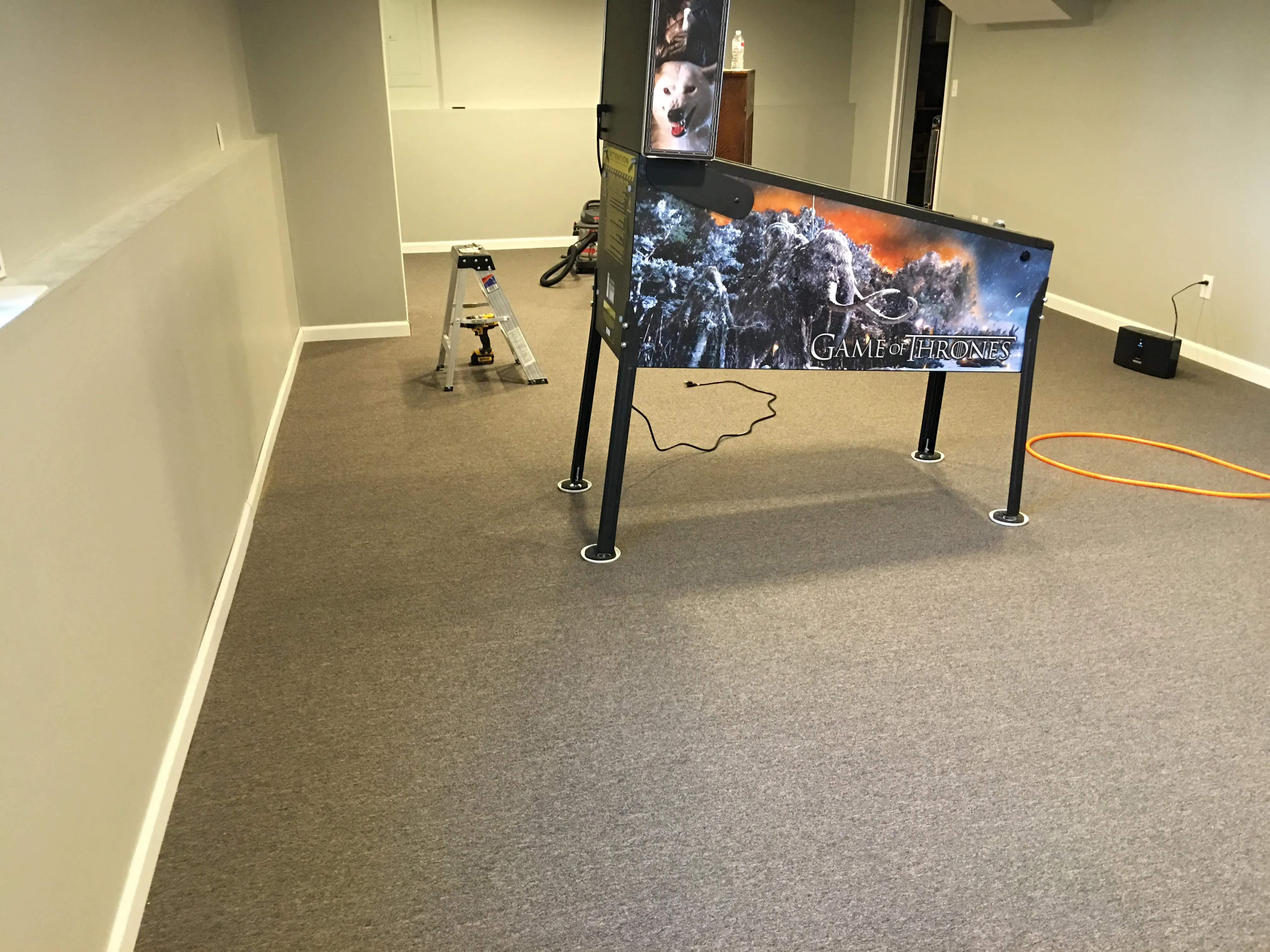 Game of Thrones, the first machine into the newly finished basement